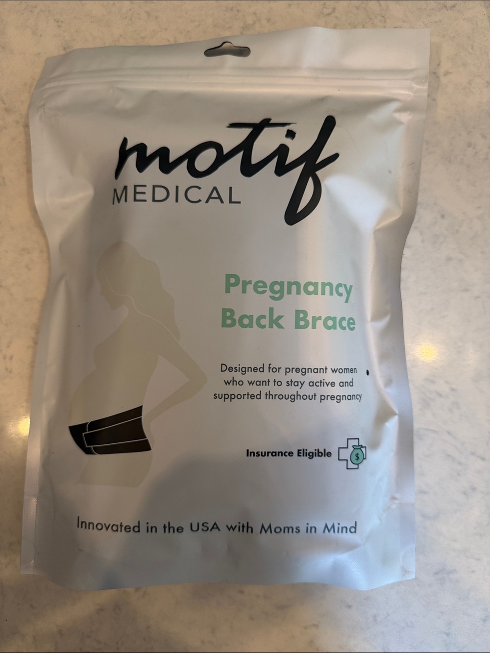 Pregnancy support band - factory sealed packaging.